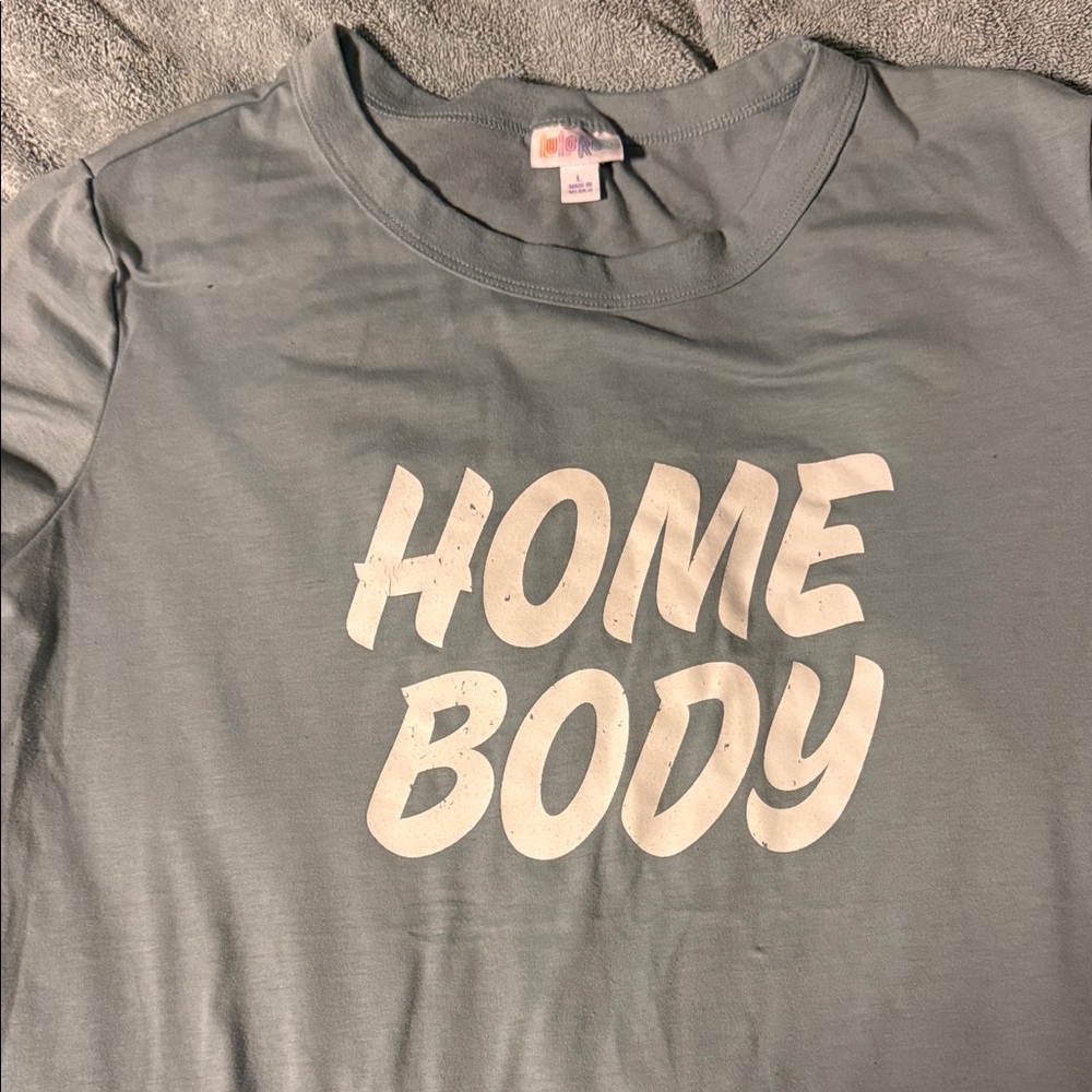 LuLaRoe Short Sleeve Tee in Light Blue with White "HOME BODY" Graphic